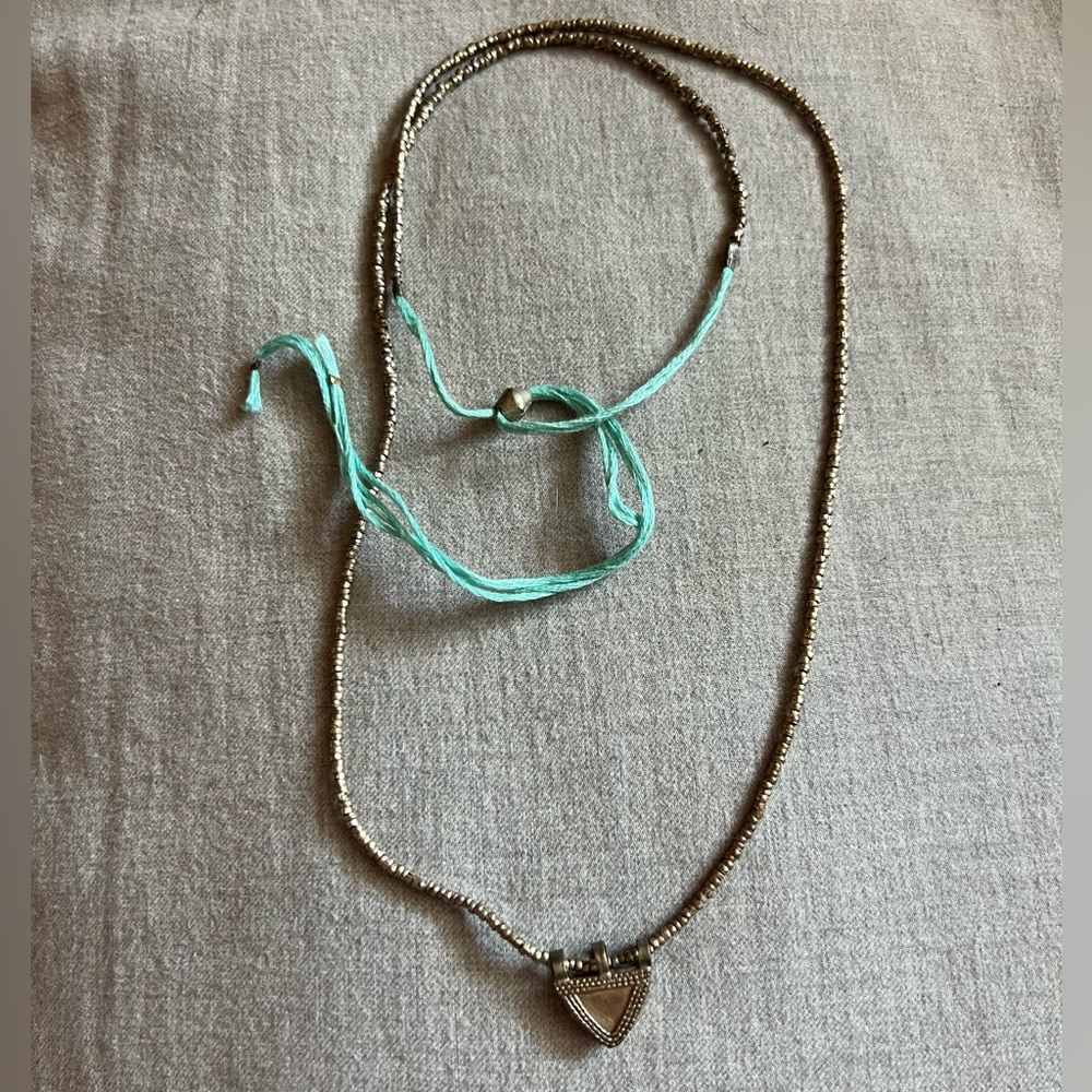 Vintage Noonday Collection Necklace made with upcycled artillery.